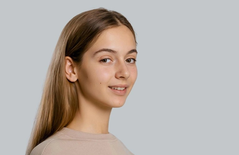 Woman in beige sweater with happy ai face expression changer