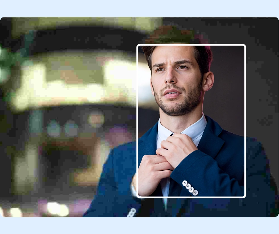 Closeup comparison of an image of a man in navy blue suit changed from blurry to enhanced image